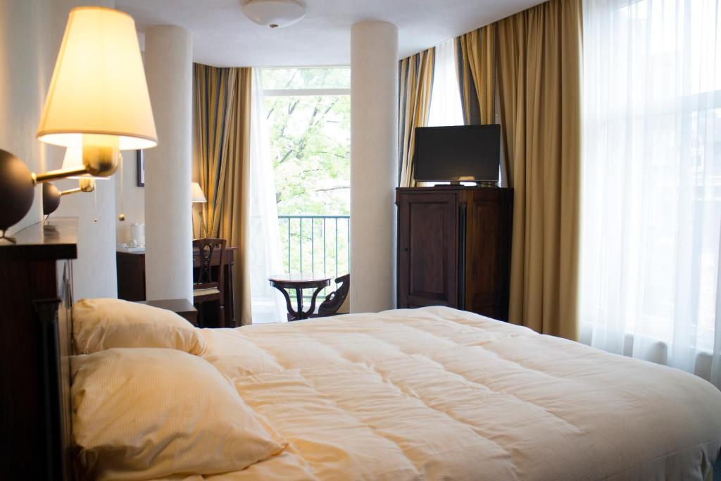 Двухместный (Двухместный номер с 2 отдельными кроватями и ванной комнатой) отеля Hotel Tongerlo, Берген-оп-Зом