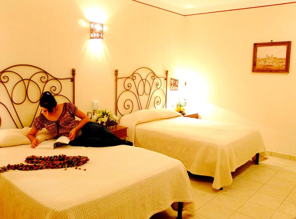 Двухместный (Большой двухместный номер с 1 кроватью) отеля Hotel Dainzu, Оахака-де-Хуарес