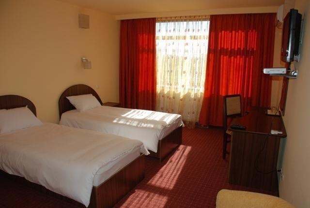 Двухместный (Двухместный номер с 1 кроватью или 2 отдельными кроватями) отеля Hotel Coliseum, Крайова