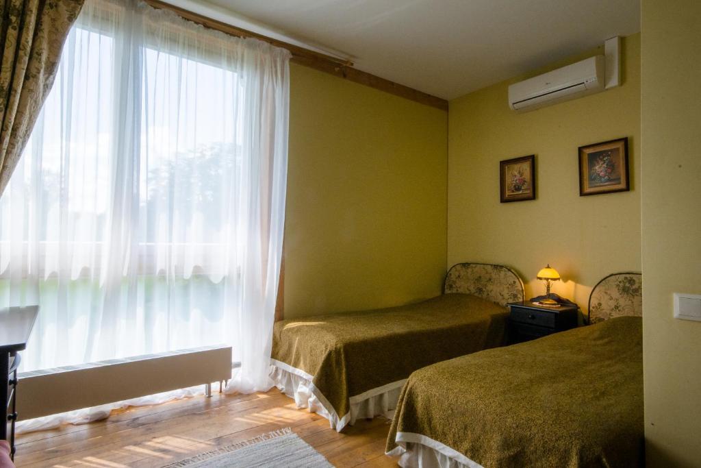 Двухместный (Двухместный номер с 1 кроватью или 2 отдельными кроватями) отеля Marcienas Muiza & SPA, Екабпилс