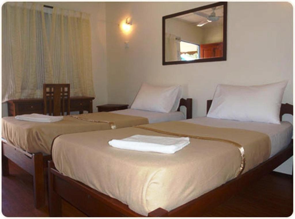 Двухместный (Стандартный двухместный номер с 1 кроватью или 2 отдельными кроватями) курортного отеля Impian Inn, Тиоман