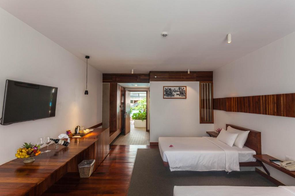 Двухместный (Представительский двухместный номер с 2 отдельными кроватями - Бесплатный трансфер в 2 стороны) курортного отеля Hotel Somadevi Angkor Boutique and Resort, Сием Рип