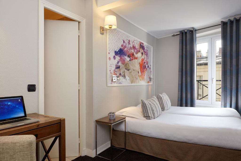 Двухместный (Классический двухместный номер с 2 отдельными кроватями) отеля Hotel Excelsior Latin, Париж