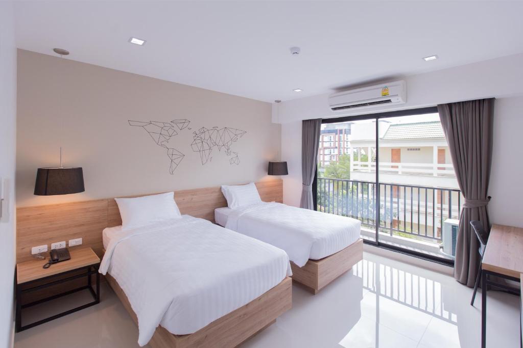 Двухместный (Стандартный двухместный номер с 2 отдельными кроватями) отеля The Journey, Бангкок