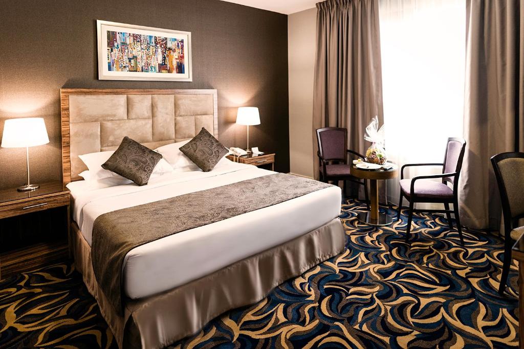 Двухместный (Стандартный двухместный номер с 1 кроватью или 2 отдельными кроватями) отеля Emirates Plaza Hotel, Абу-Даби