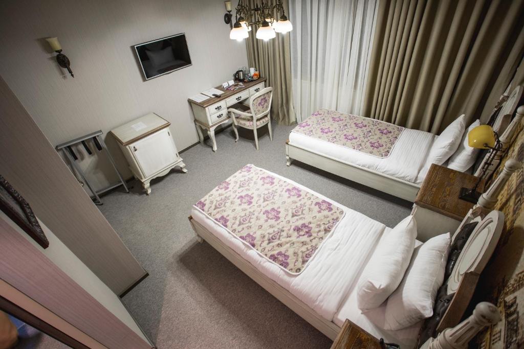 Двухместный (Двухместный номер с 2 отдельными кроватями и ванной комнатой) отеля Баку