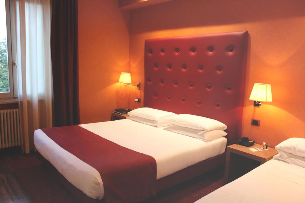 Трехместный (Классический номер с кроватью размера «king-size») отеля Best Western Hotel Piemontese, Бергамо