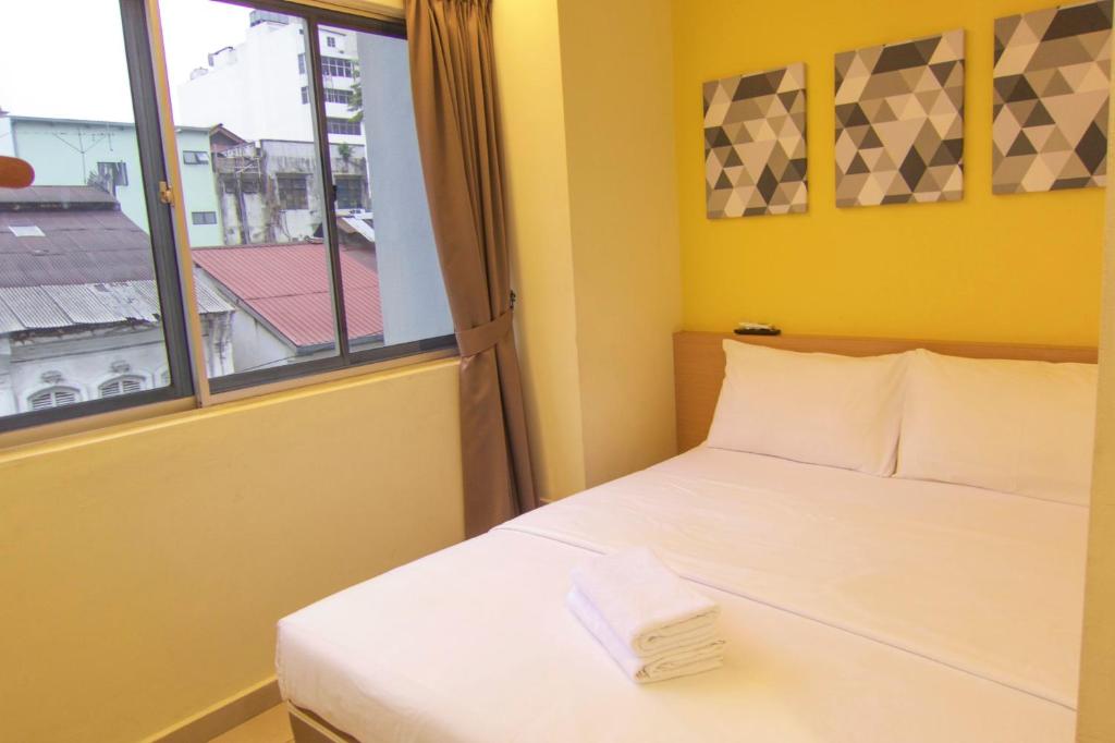 Двухместный (Небольшой двухместный номер с 1 кроватью и окнами) отеля Hotel 1000 Miles, Куала-Лумпур