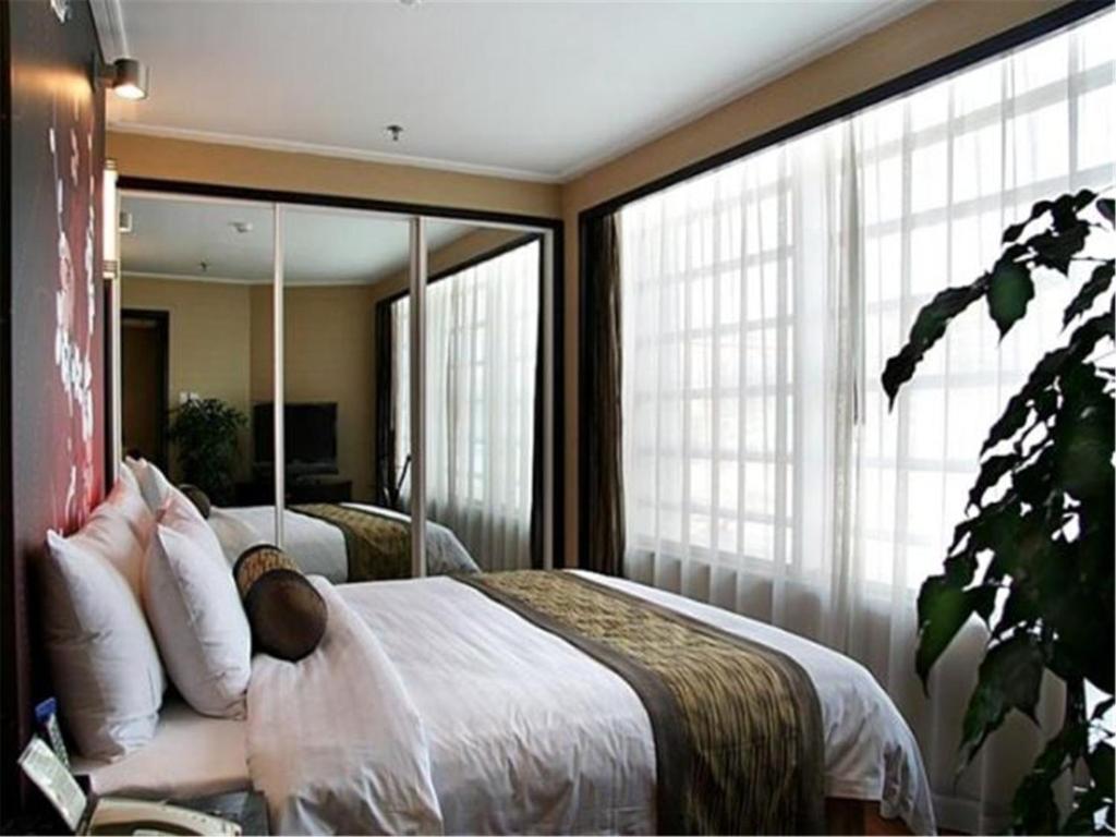 Сьюит (Бизнес-люкс) отеля Qingdao Blue Horizon Hotel - Laoshan, Циндао