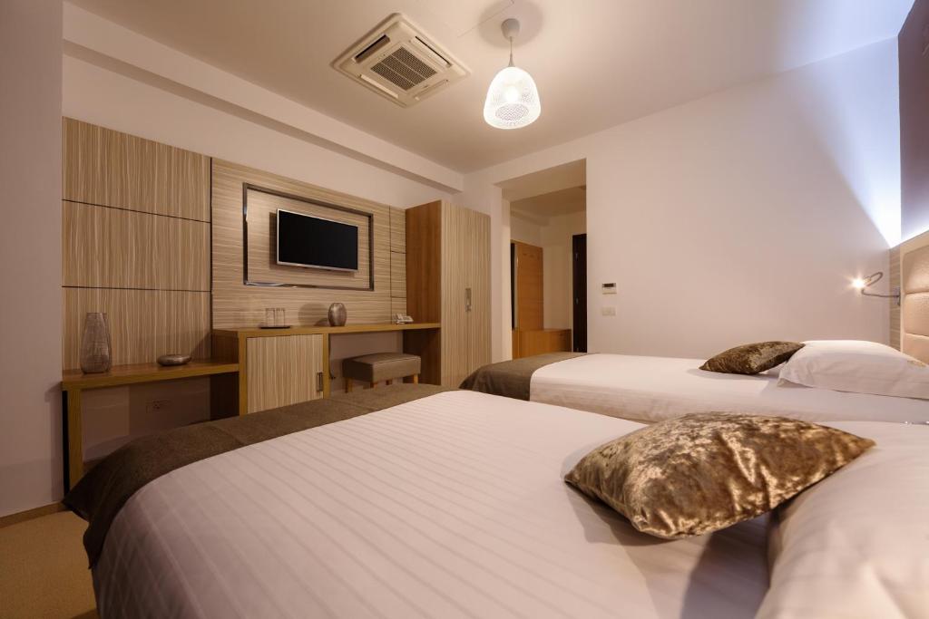 Двухместный (Двухместный номер с 2 отдельными кроватями) курортного отеля Premium Wellness Institute, Бухарест
