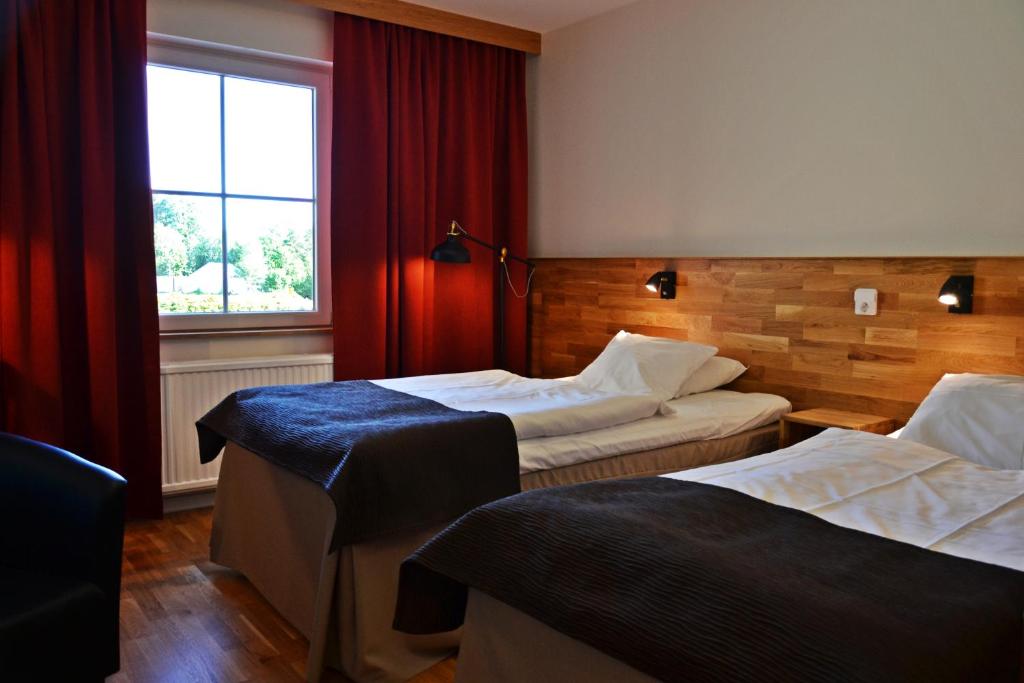 Двухместный (Стандартный двухместный номер с 2 отдельными кроватями) отеля Dalhall Hotell & Restaurang - Sweden Hotels, Омоль