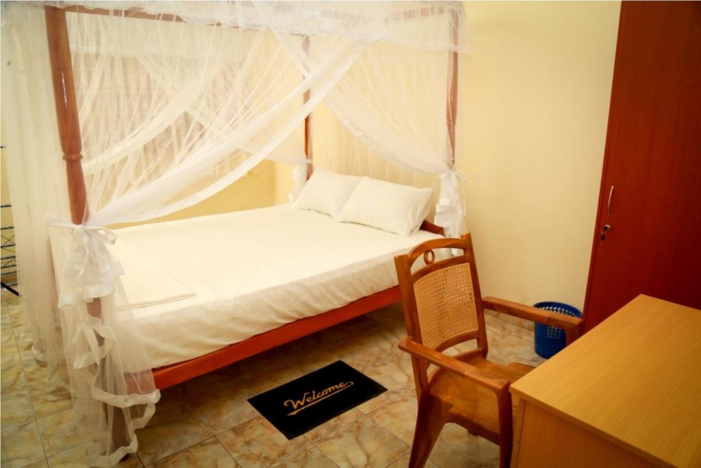Двухместный (Стандартный двухместный номер с 1 кроватью и вентилятором) семейного отеля Jaya Home Stay, Тангалла
