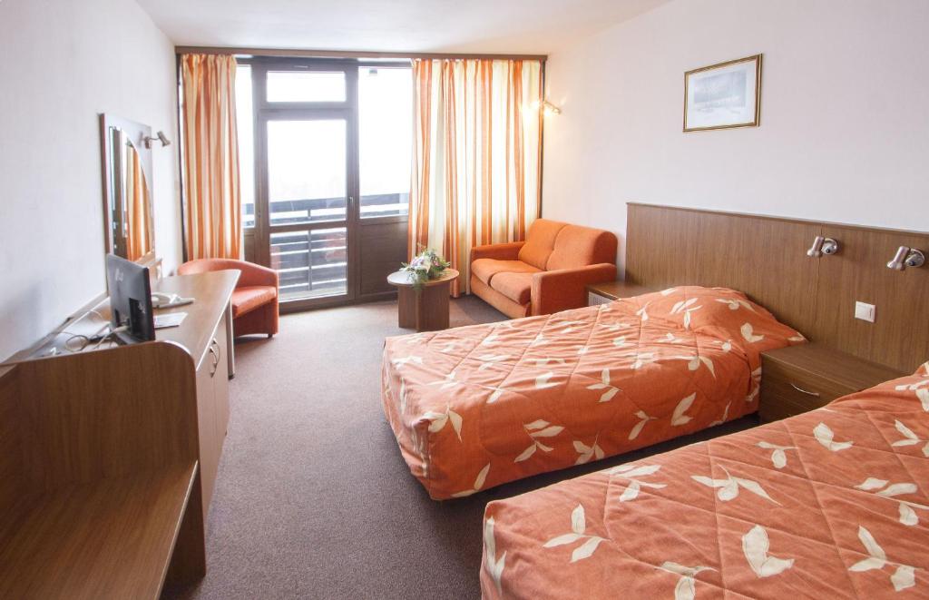 Двухместный (Двухместный номер с 2 отдельными кроватями - Доступ в спа-центр) отеля Hotel Samokov, Боровец