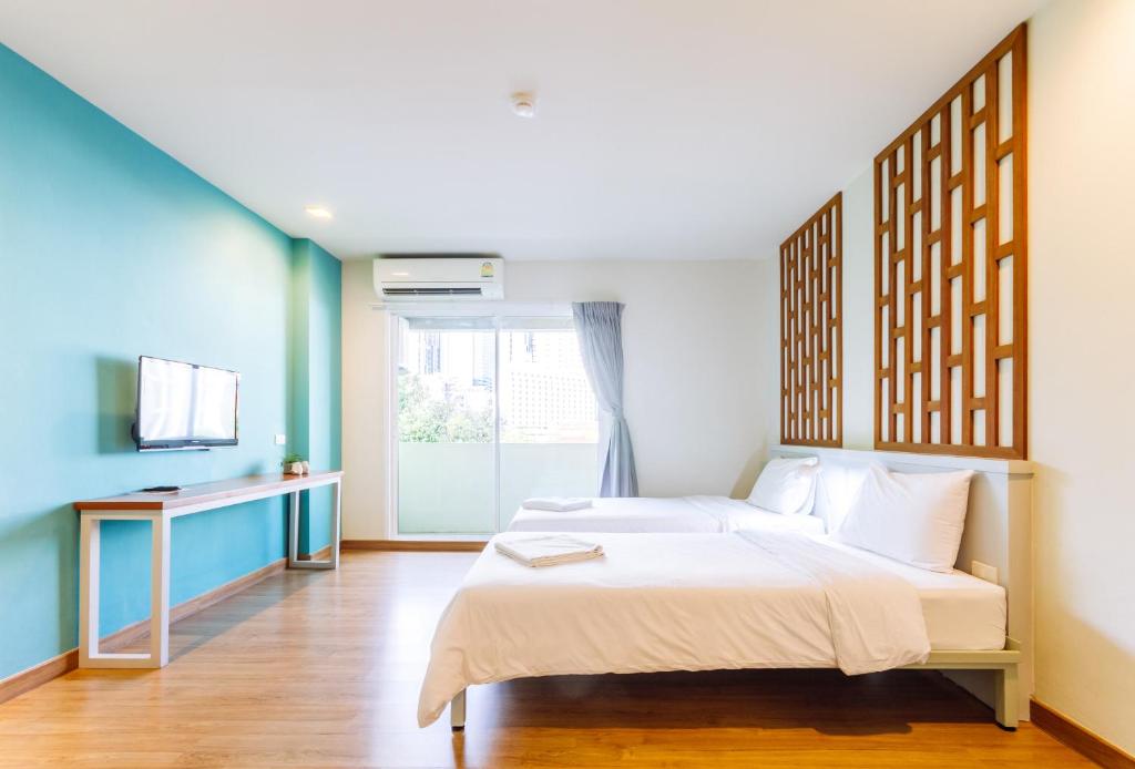 Двухместный (Двухместный номер Делюкс с 2 отдельными кроватями) хостела Siamaze, Бангкок
