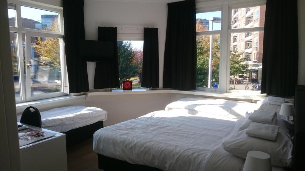Двухместный (Стандартный двухместный номер с 2 отдельными кроватями) отеля Hotel-Chao, Утрехт