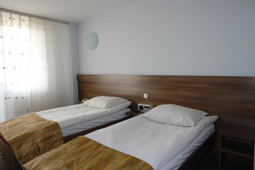 Двухместный (Двухместный номер с 1 кроватью или 2 отдельными кроватями) отеля Hotel Junior, Замосць