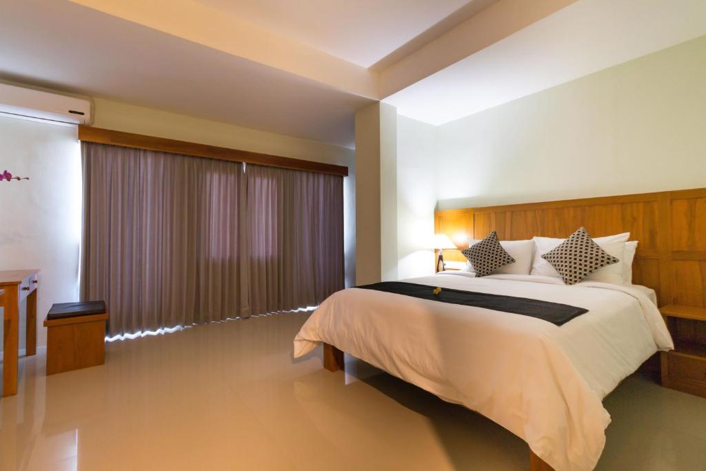 Двухместный (Двухместный номер Делюкс с 1 кроватью или 2 отдельными кроватями) отеля AB Hotel Kuta, Кута