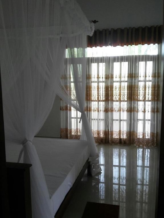Двухместный (Бюджетный двухместный номер с 1 кроватью) семейного отеля Bimal Villa, Бентота