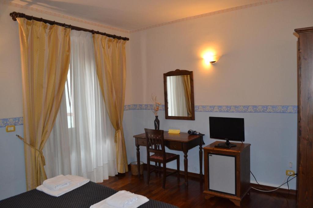Двухместный (Двухместный номер с 1 кроватью или 2 отдельными кроватями, вид на город) отеля Stesicorea Palace, Катания