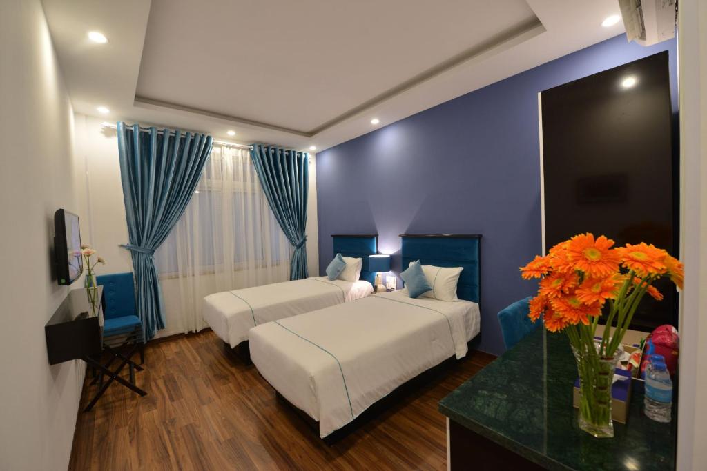 Двухместный (Улучшенный двухместный номер с 2 отдельными кроватями) отеля Hoi An Emerald Waters Hotel & Spa, Хойан