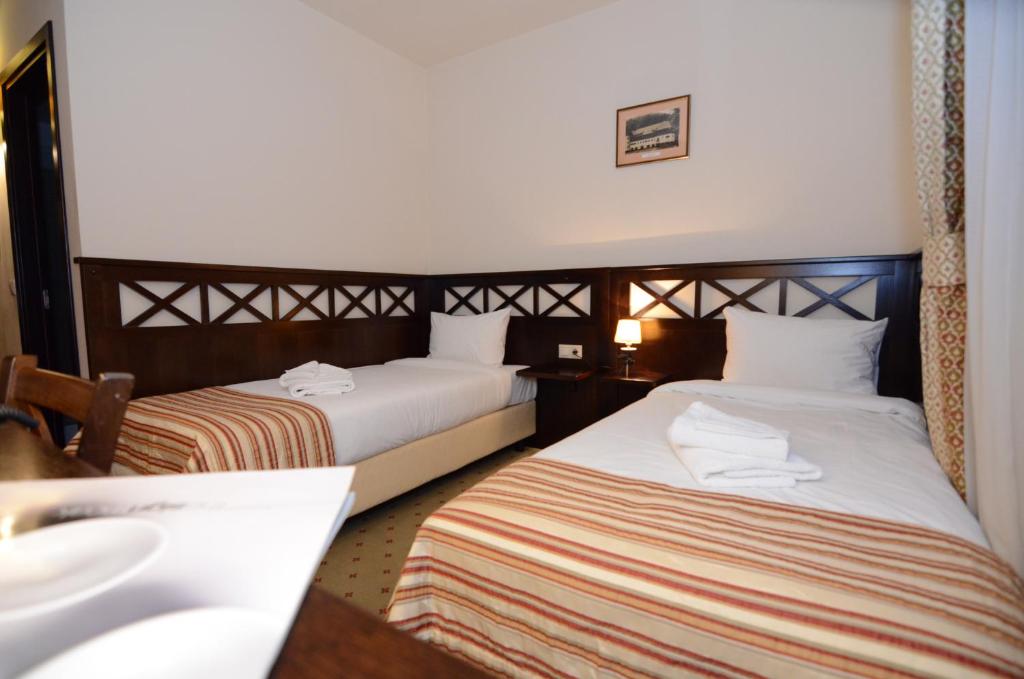 Двухместный (Стандартный двухместный номер с 2 отдельными кроватями) отеля Hotel Gradina Morii, Сигету-Мармацией