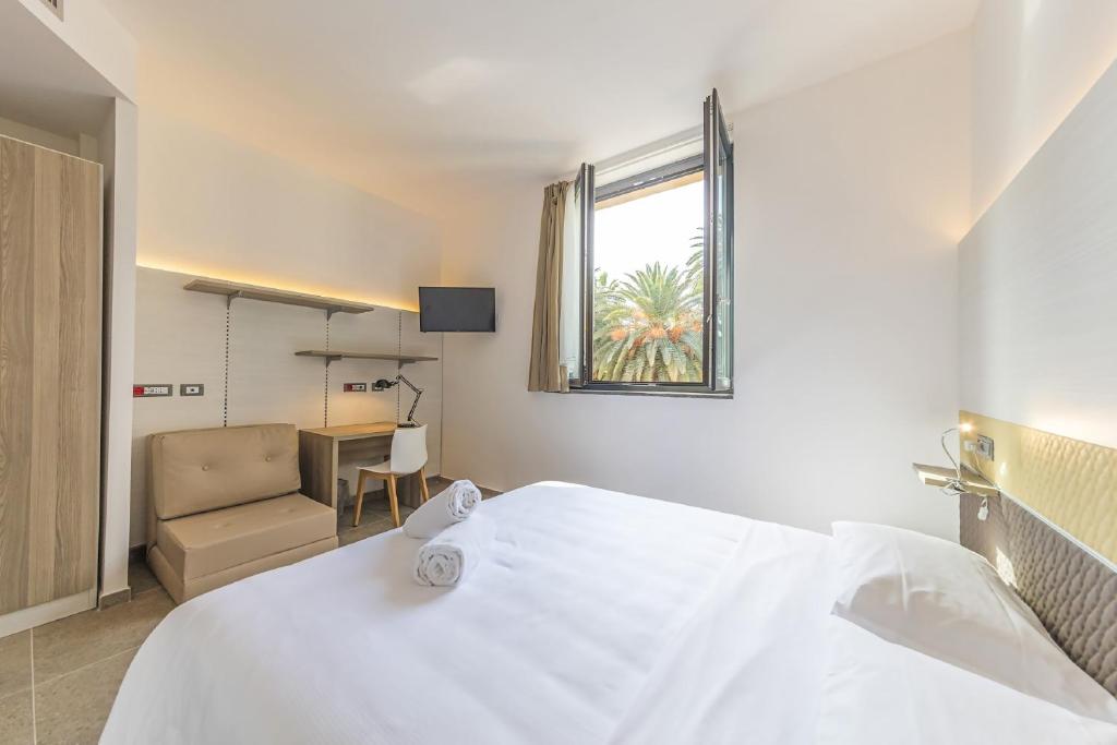 Двухместный (Улучшенный двухместный номер с 1 кроватью или 2 отдельными кроватями) отеля Camplus Guest Palermo, Палермо
