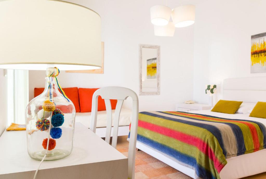 Двухместный (Двухместный номер с двуспальной кроватью и дополнительной кроватью) отеля Hotel Casa Do Outeiro, Баталья