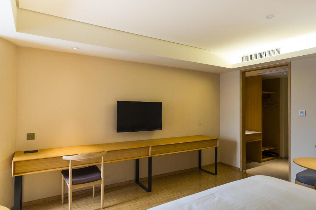 Двухместный (Улучшенный двухместный номер с 1 кроватью) отеля JI Hotel Shanghai Lujiazui South Pudong Road, Шанхай