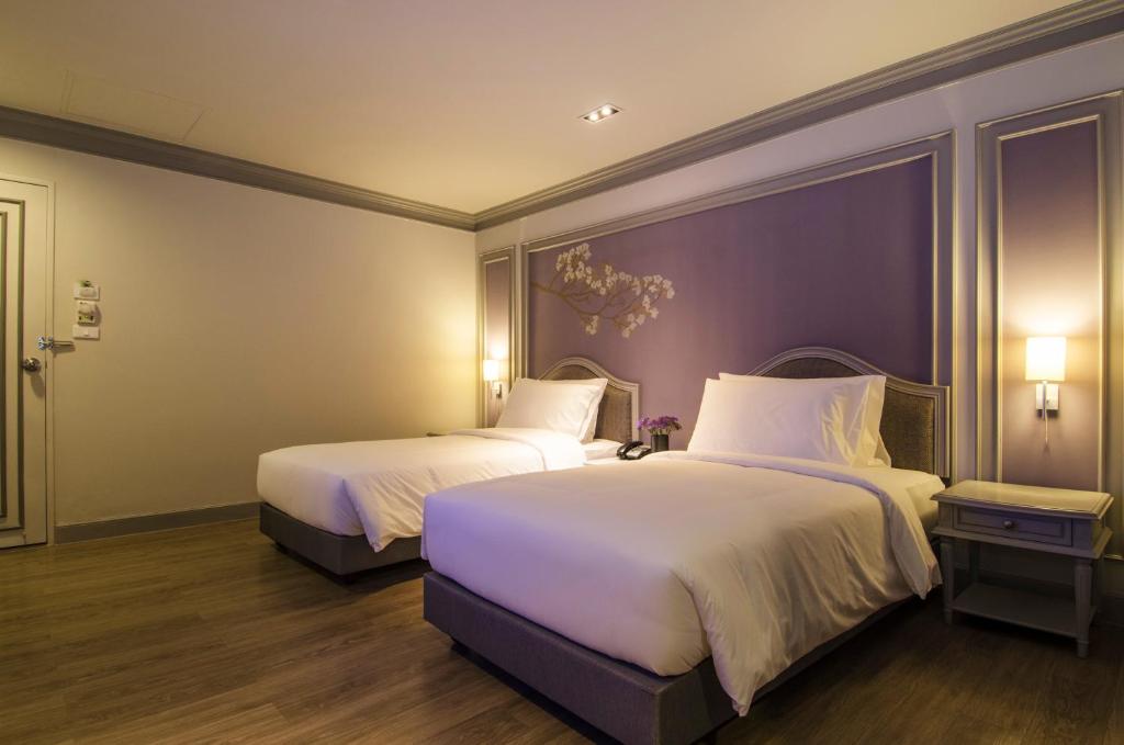 Двухместный (Улучшенный двухместный номер с 2 отдельными кроватями) отеля Pantip Ladprao, Бангкок