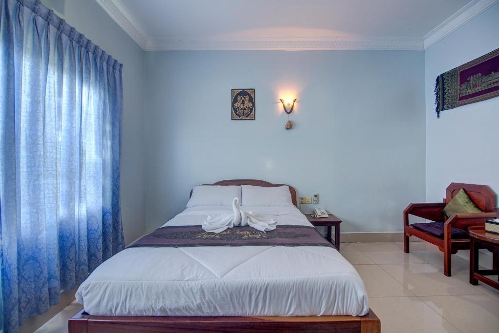 Двухместный (Стандартный двухместный номер с 1 кроватью) отеля DV Angkor Villa, Сием Рип