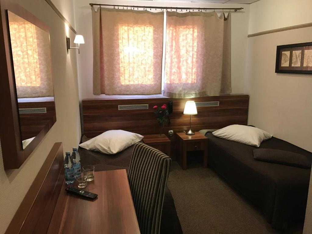 Двухместный (Стандартный двухместный номер с 1 кроватью или 2 отдельными кроватями) отеля Hotel & Restauracja Glass, Радом