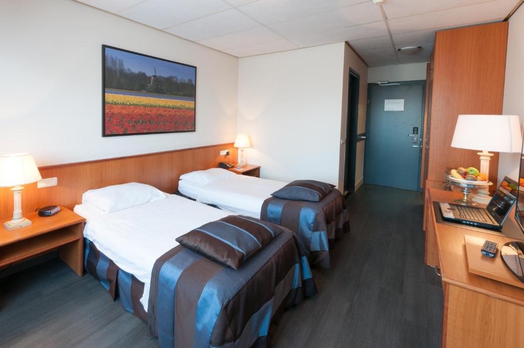 Двухместный (Двухместный номер эконом-класса с 2 отдельными кроватями) отеля Hotel De Rustende Jager, Схипхол