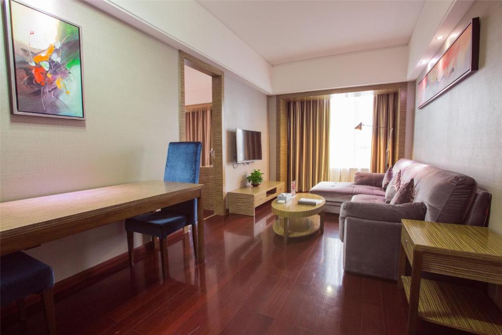 Сьюит (Представительский люкс) отеля La Perle International Hotel, Гуанчжоу