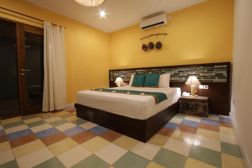 Двухместный (Улучшенный двухместный номер с 1 кроватью) парк-отеля Green Bird Villa, Убуд
