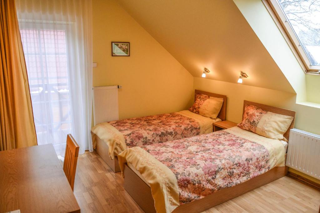 Двухместный (Двухместный номер с 2 отдельными кроватями и балконом) гостевого дома Vila Liepa, Бирштонас
