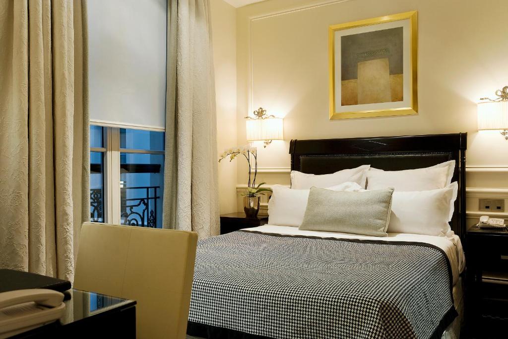 Двухместный (Классический двухместный номер с 1 кроватью (кровать 140 см и душ)) отеля Hôtel Keppler, Париж
