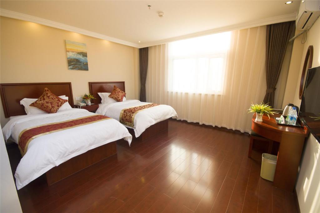 Двухместный (Двухместный номер бизнес-класса с 2 отдельными кроватями) отеля GreenTree Inn Zhejiang Hangzhou Linan Wanma Road Express Hotel, Линьань