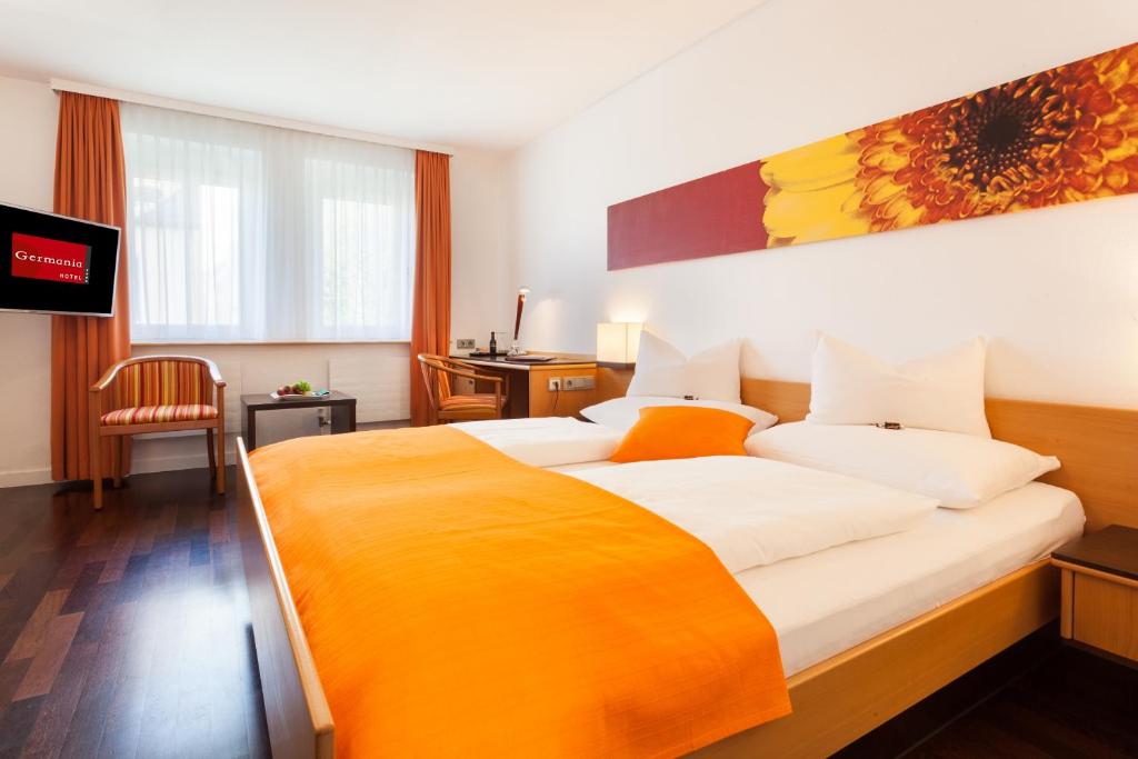 Двухместный (Улучшенный двухместный номер с 1 кроватью) отеля Hotel Germania, Брегенц