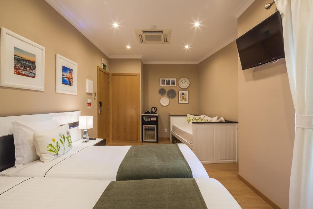 Двухместный (Улучшенный двухместный номер с 2 отдельными кроватями) гостевого дома Vila Nova Guesthouse, Лиссабон