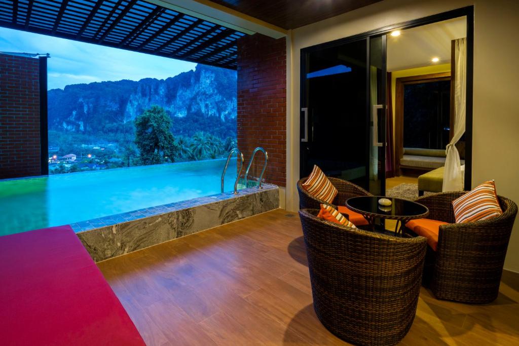 Сьюит (Люкс с 2 спальнями и отдельным бассейном) курортного отеля Ao Nang Phu Pi Maan Resort & Spa, Краби