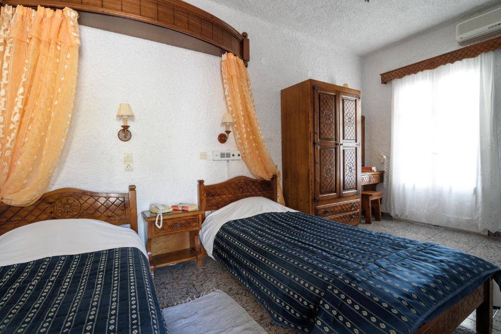 Двухместный (Двухместный номер с 1 кроватью или 2 отдельными кроватями) отеля Hotel Porto Perissa, Перисса