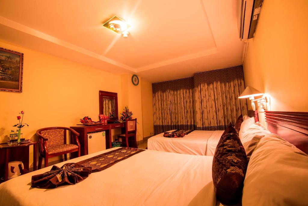Двухместный (Улучшенный двухместный номер с 1 кроватью) отеля Pacific Hotel, Дананг