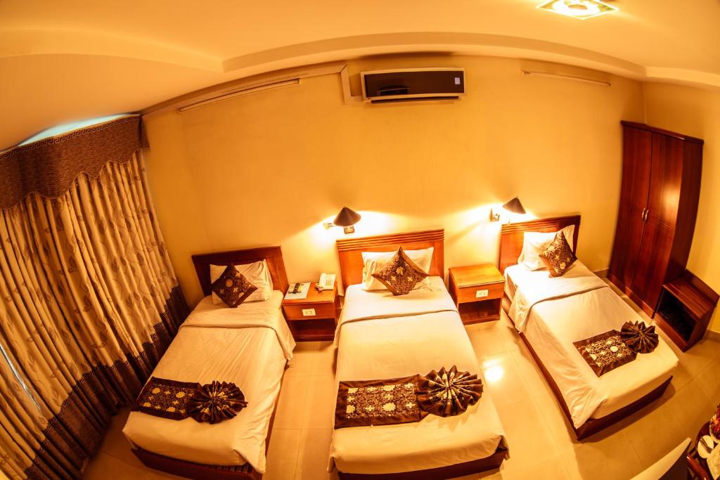 Двухместный (Улучшенный двухместный номер с 2 отдельными кроватями) отеля Pacific Hotel, Дананг