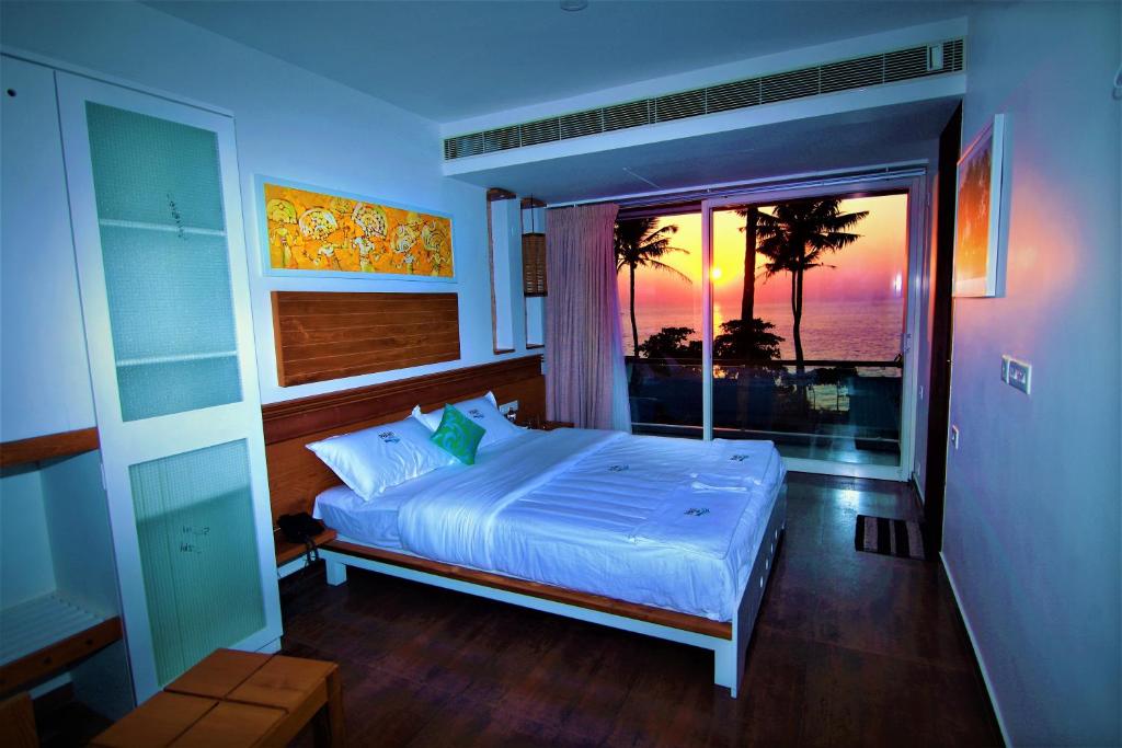 Двухместный (Двухместный номер Делюкс с 1 кроватью и балконом, вид на море) курортного отеля Palan Beach Resort, Варкала