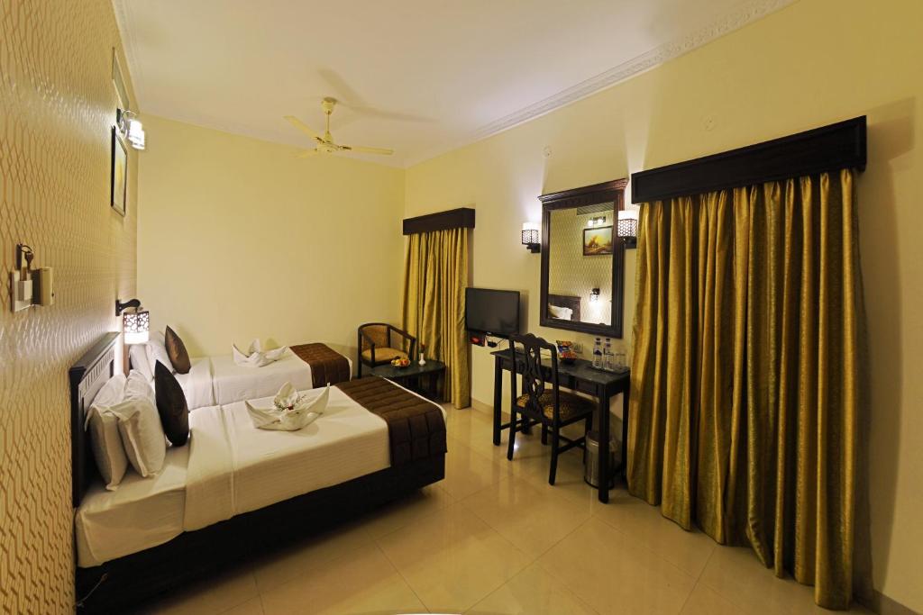 Двухместный (Стандартный двухместный номер с 1 кроватью или 2 отдельными кроватями) отеля Raj Palace Sundar, Ченнаи