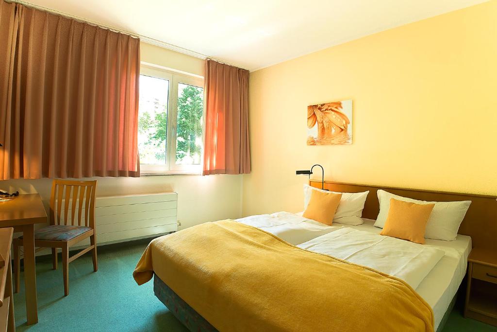 Двухместный (Двухместный номер с 1 кроватью или 2 отдельными кроватями) отеля Apart Hotel Gera, Гера