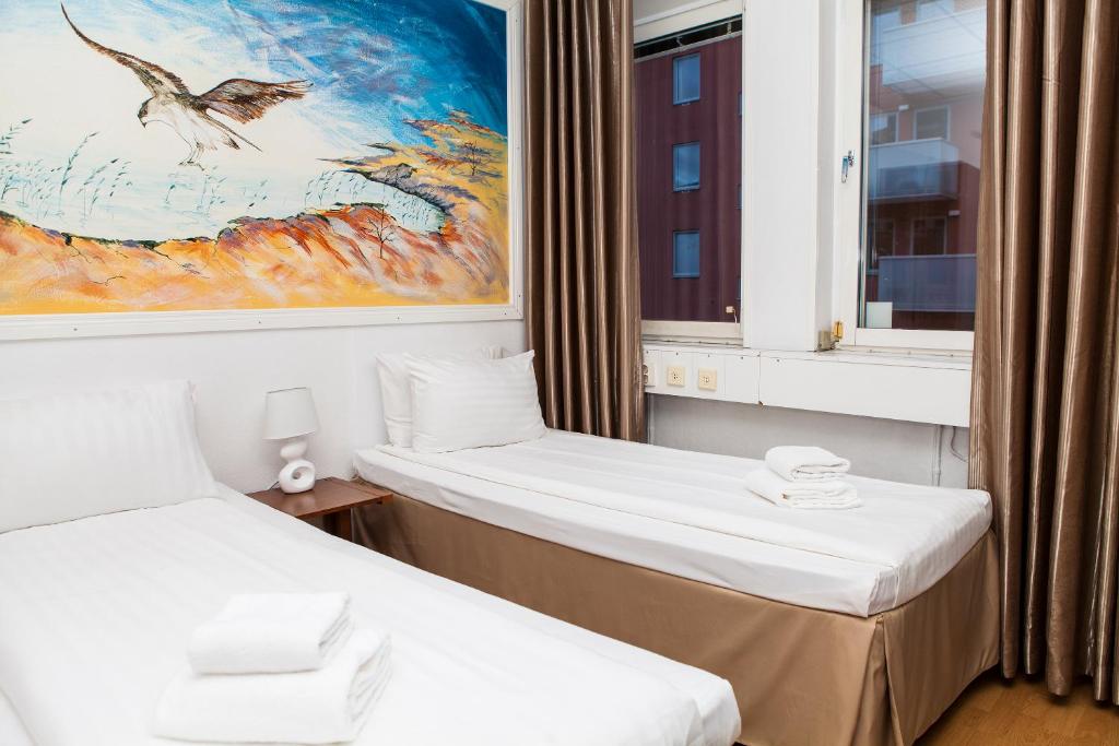 Четырехместный (Четырехместный номер с общей ванной комнатой - Дополнительное здание) отеля Hotel Älvsjö, Стокгольм