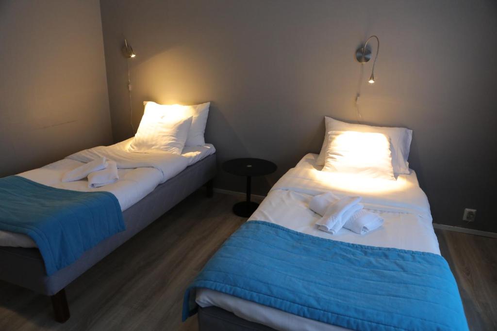 Двухместный (Двухместный номер бизнес-класса с 2 отдельными кроватями) отеля Hotel Nukkumatti, Коккола