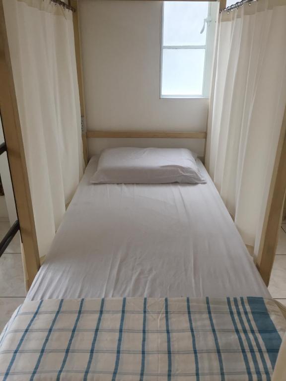 Номер (Кровать в общем номере с 4 кроватями) хостела 1 River Central Hostel, Манила