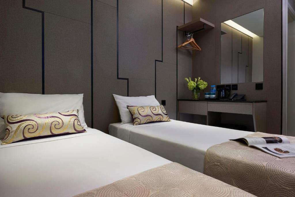 Двухместный (Улучшенный двухместный номер с 2 отдельными кроватями) отеля Hotel 81 Gold, Сингапур (город)
